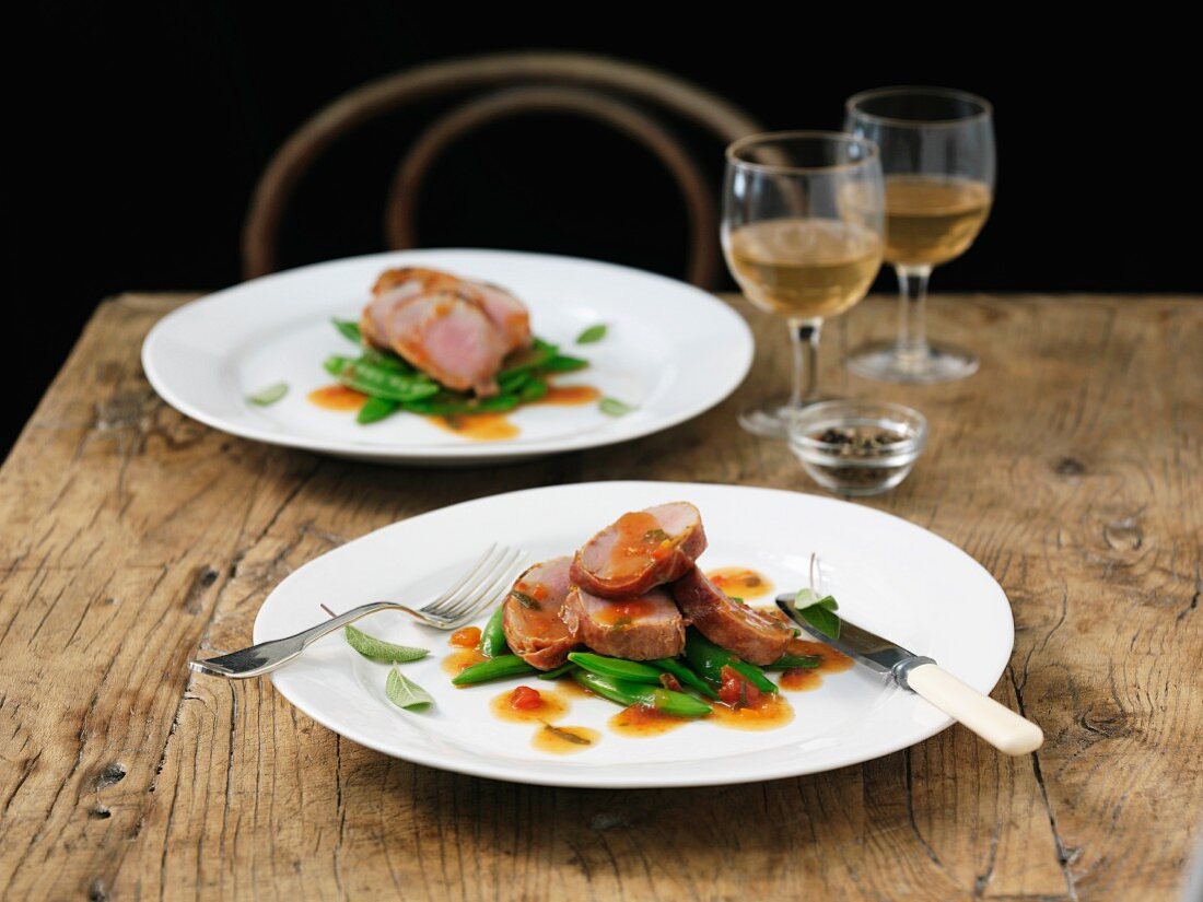 Pork saltimbocca with mange tout and sage