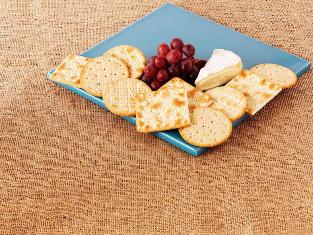 Crackers, Camembert cheese and grapes