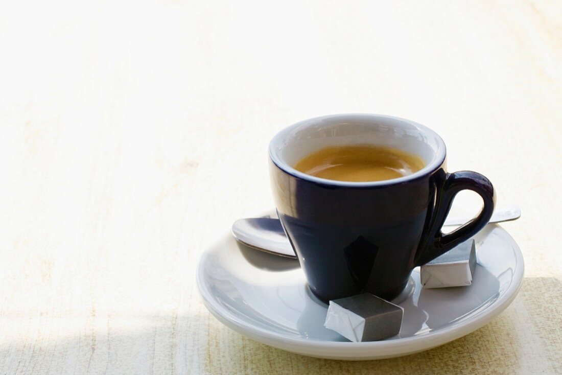 An espresso on a cafe table