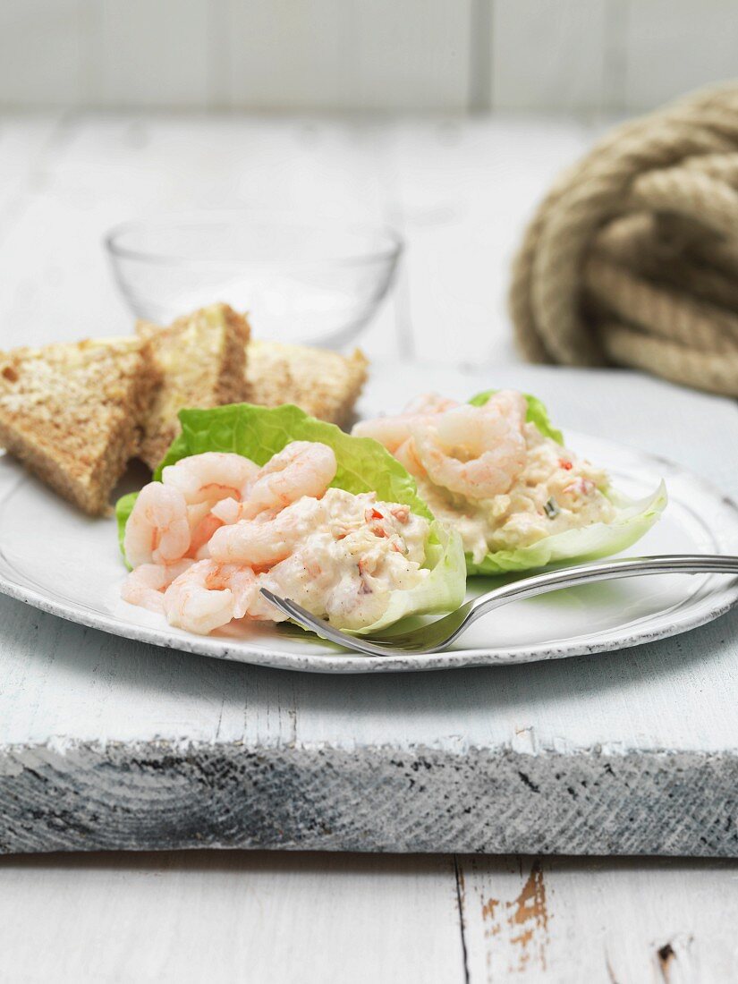 Prawn salad on lettuce leaves