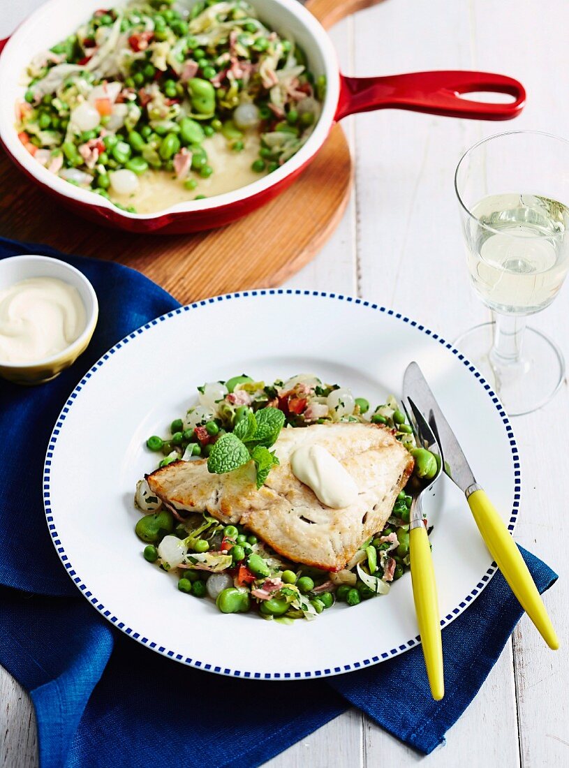 Snapper fillets with braised peas, broad beans and pancetta