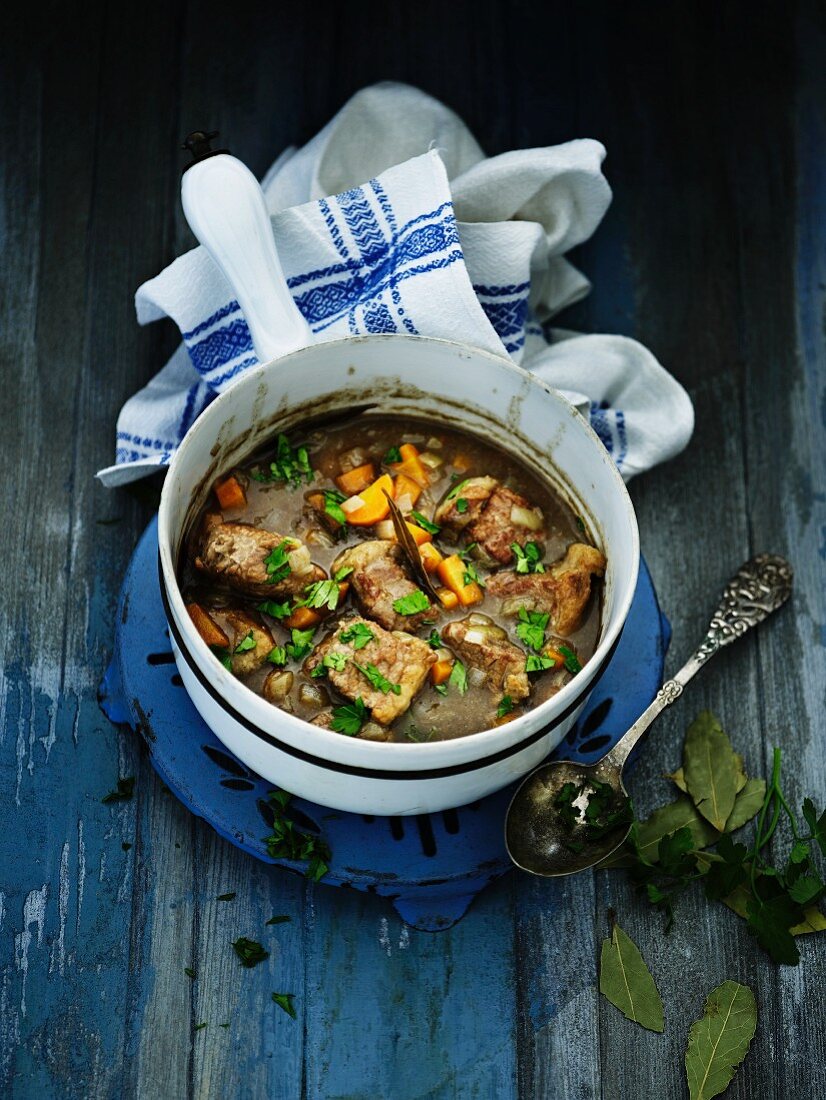 Veal ragout with carrots, spring onions and parsley