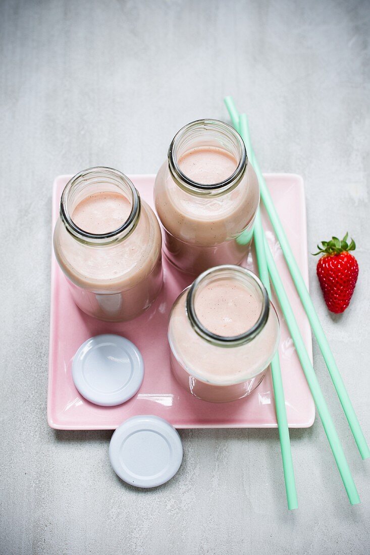 Strawberry protein shakes in bottles