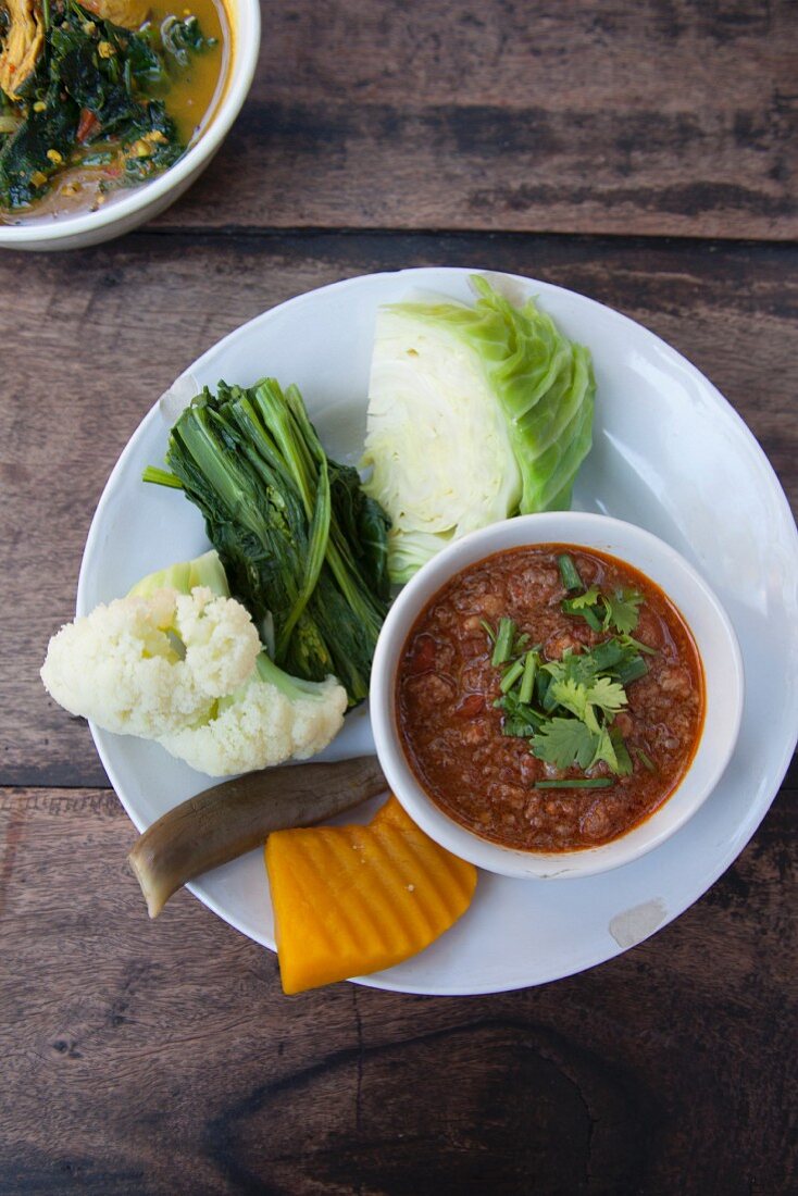 Vegetables with a tomato and pork dip (Thailand)