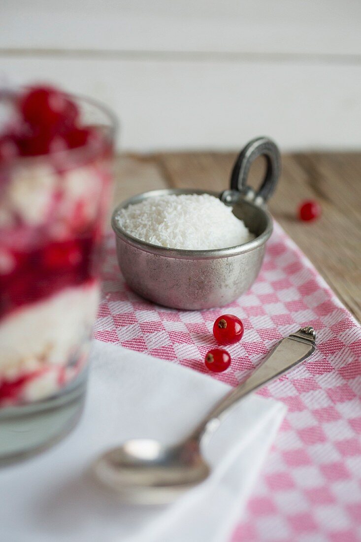 Coconut flakes and redcurrants
