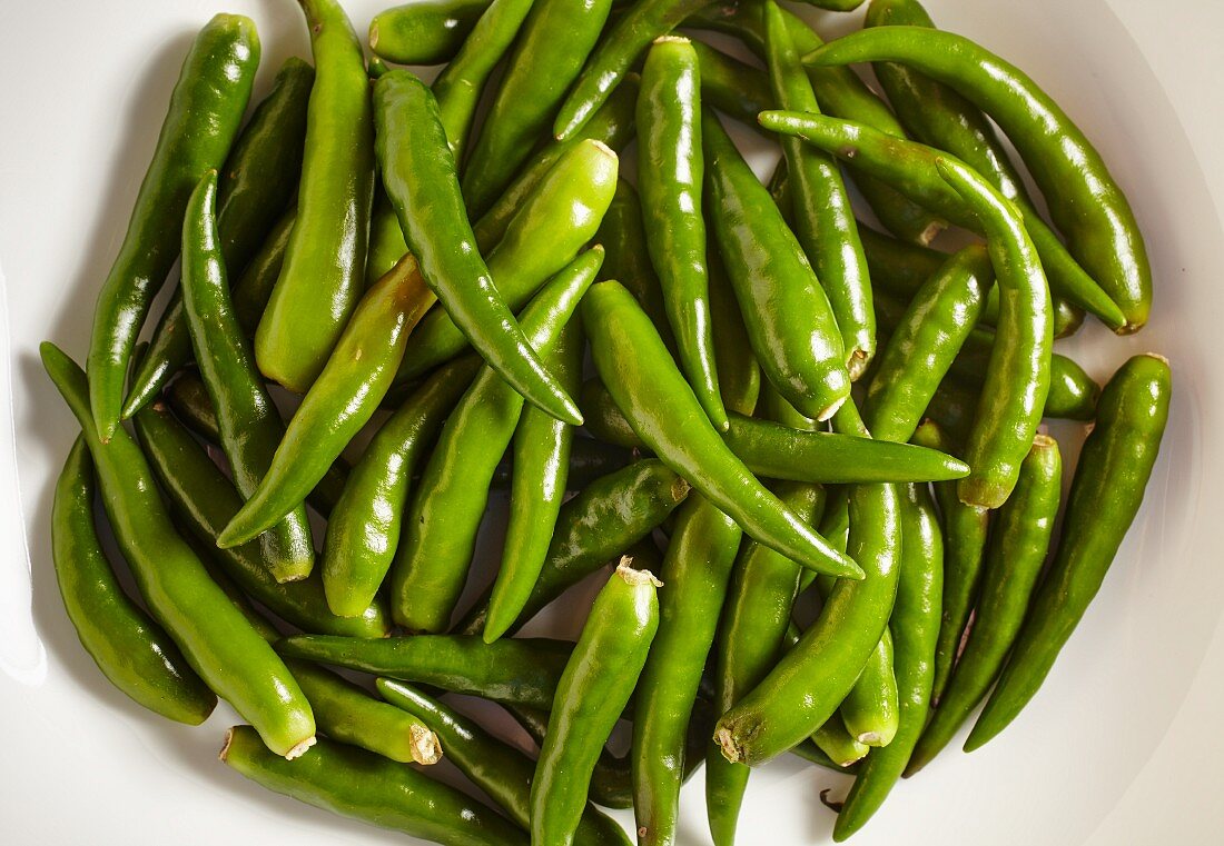 Fresh green Thai chilli peppers (seen from above)