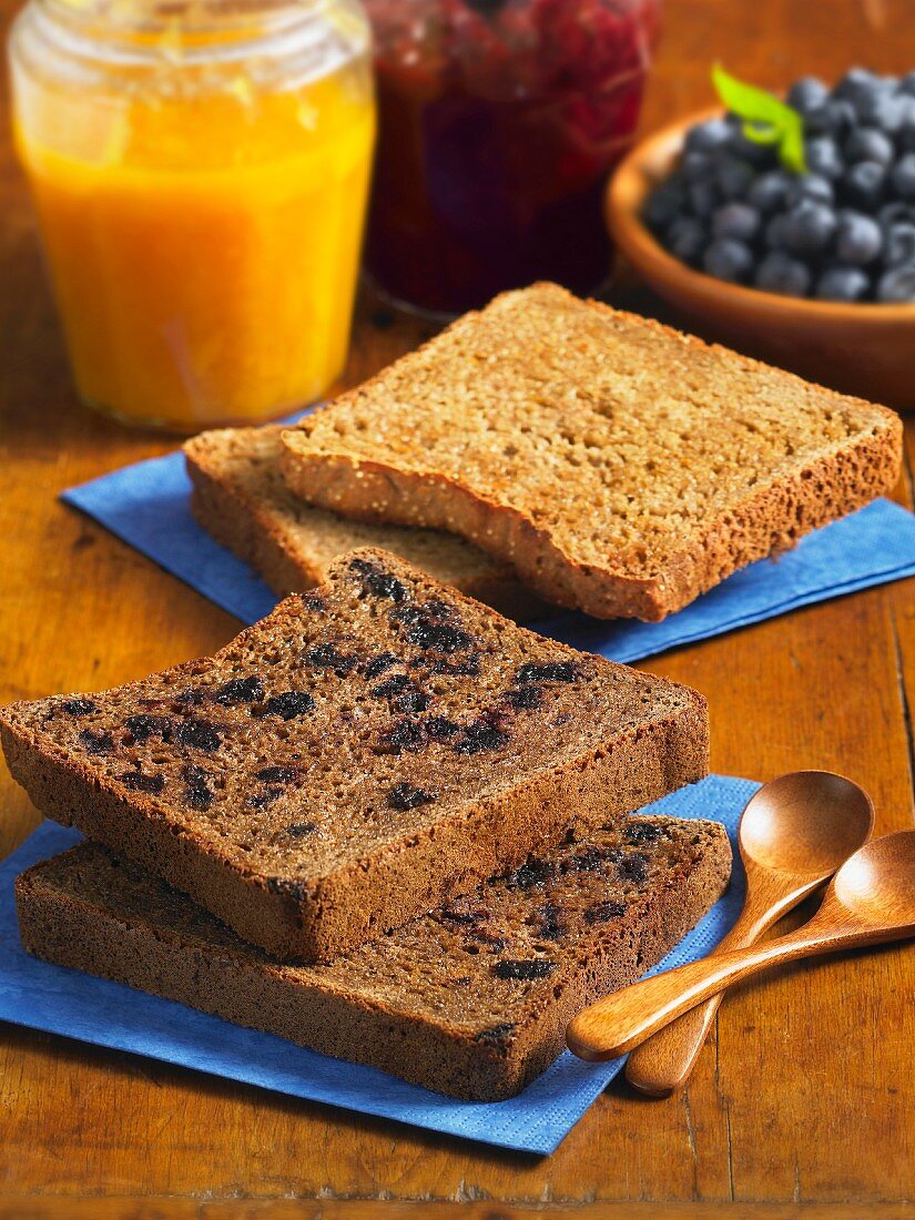 Buckwheat and blueberry toast, and oat toast, jam and blueberries