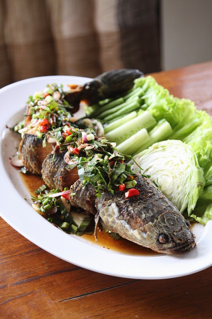Fried snakehead with vegetables