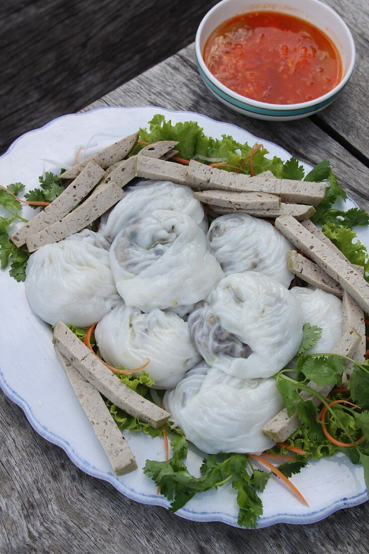 Stuffed noodle dumplings with strips of sausage