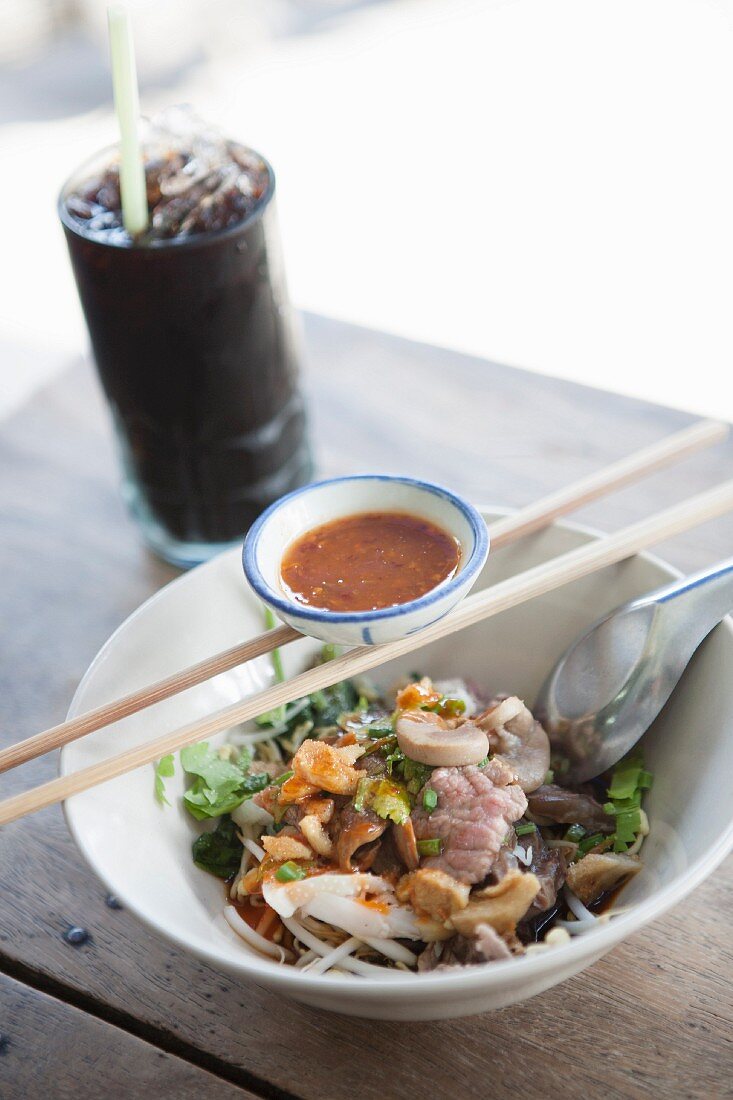 Rice noodles with beef and garlic, Thailand