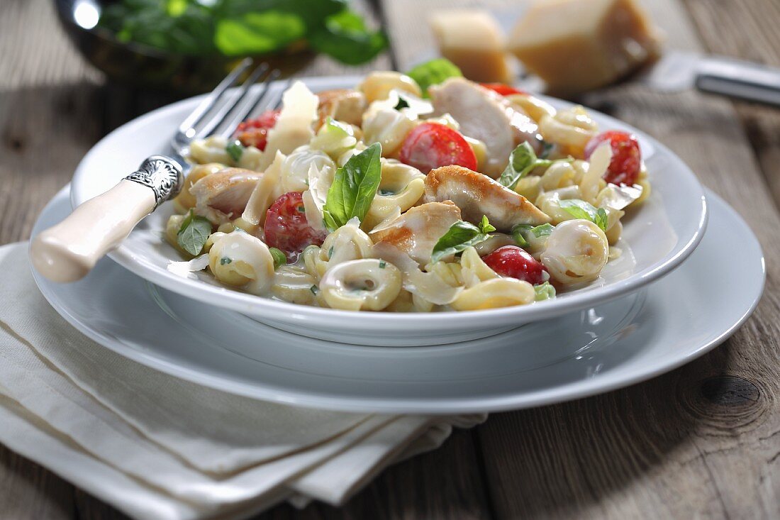 Tortellini with chicken and tomatoes in a creamy sauce