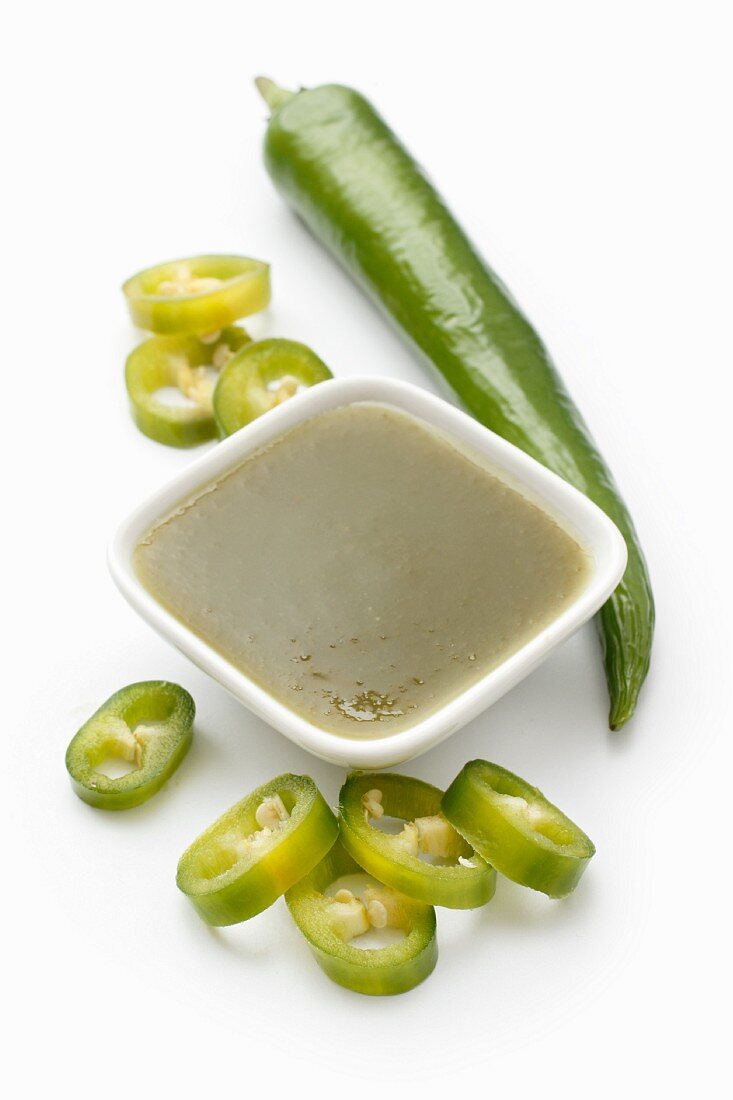 Green chilli sauce in a small bowl