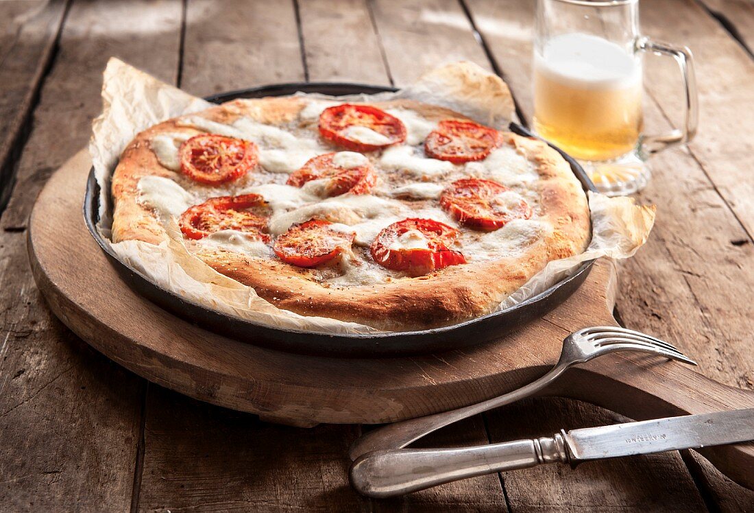 Margherita pizza and beer