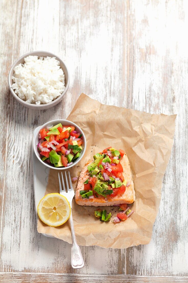 Baked salmon with avocado and tomato salsa and rice