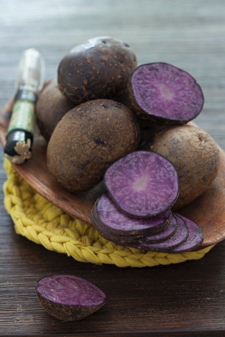 Purple potatoes, whole and sliced