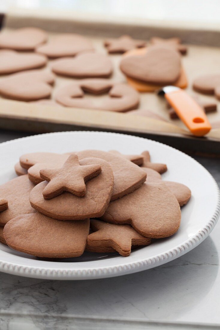 Peanut butter and chocolate biscuits shaped like hearts and stars