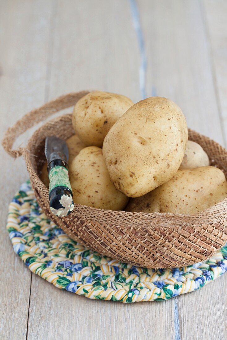New potatoes with a peeler