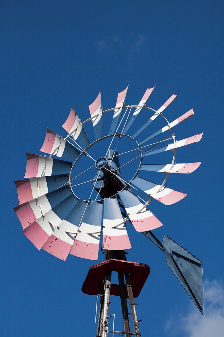 Windmill against blue sky