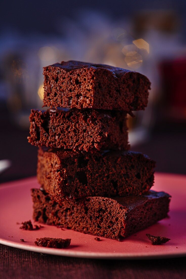 A stack of chocolate cake slices