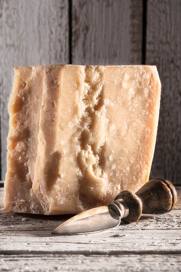 A large piece of Grana Padano cheese