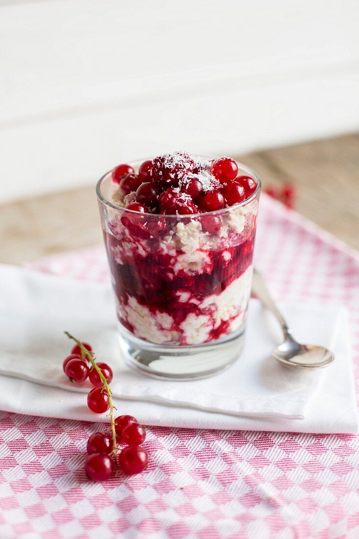 Porridge with raspberries and redcurrants