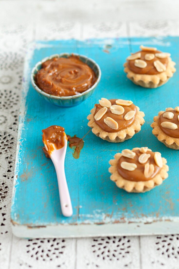 Mini cupcakes with caramel cream and almonds