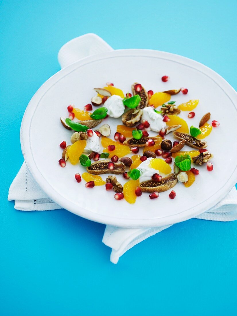 Orange and walnut salad with pomegranate seed and dried figs