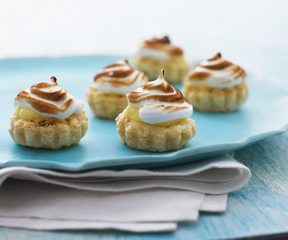 Puff pastry vanilla tartlets topped with meringue