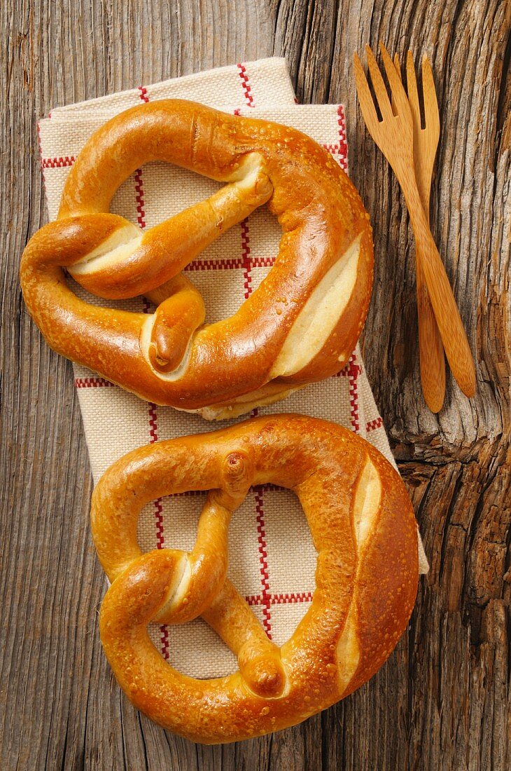 Two pretzels on a tea towel