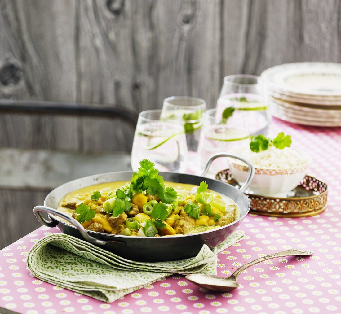 Chicken curry with spring onions, chickpeas and coriander