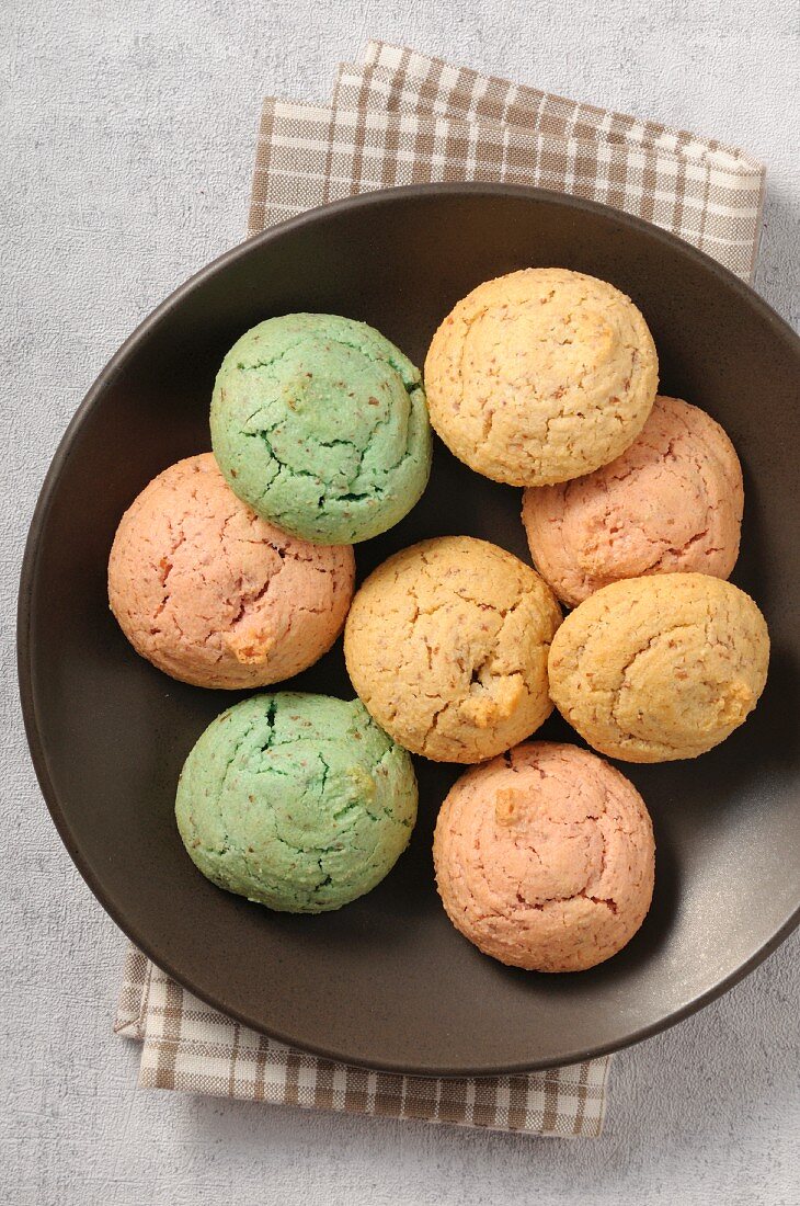 A bowl of pastel-coloured macaroons