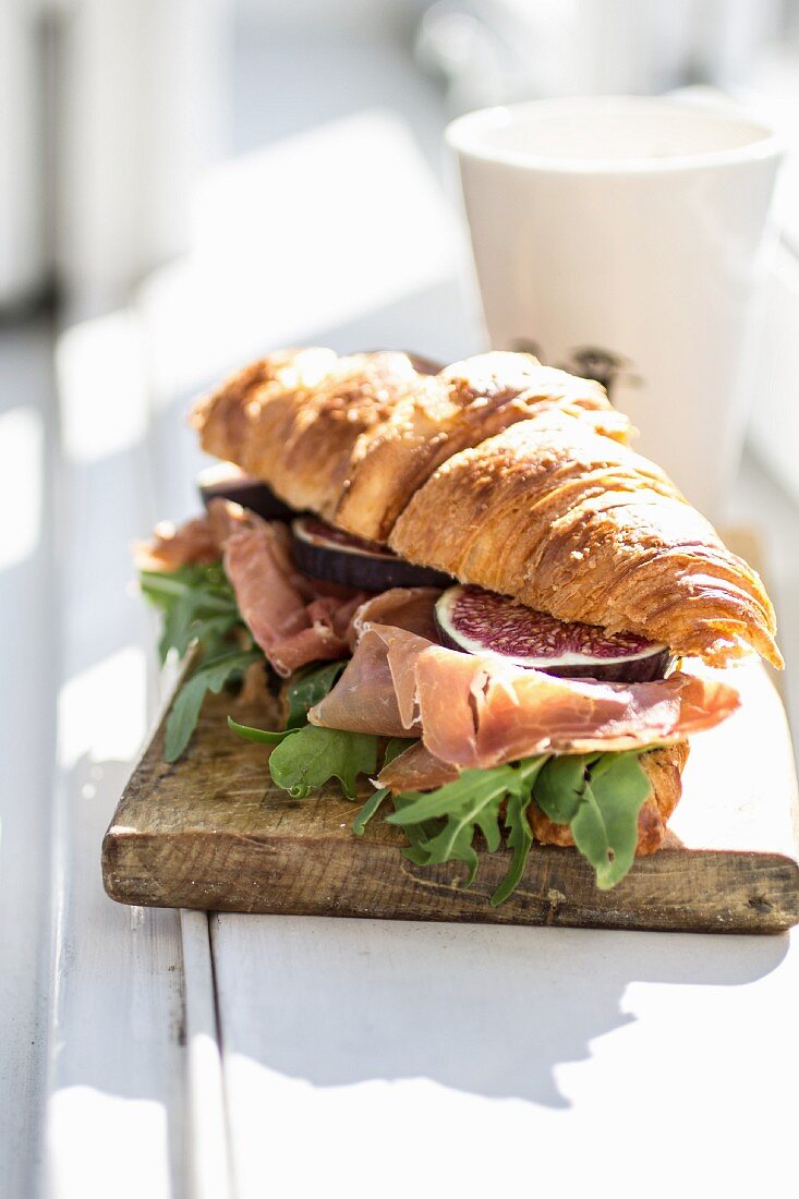 A croissant with prosicutto, figs and rocket