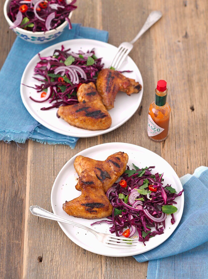 Grilled chicken wings with red cabbage salad