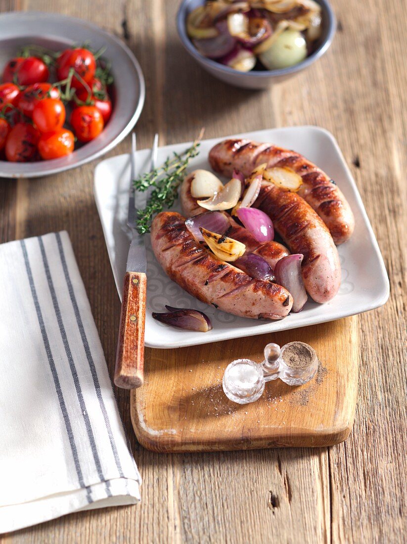 Grilled white sausage with onions