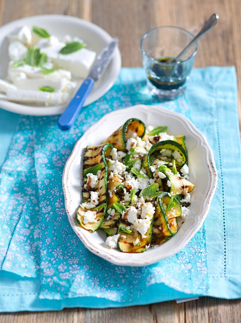 Grilled courgette with feta cheese, garlic and balsamic sauce