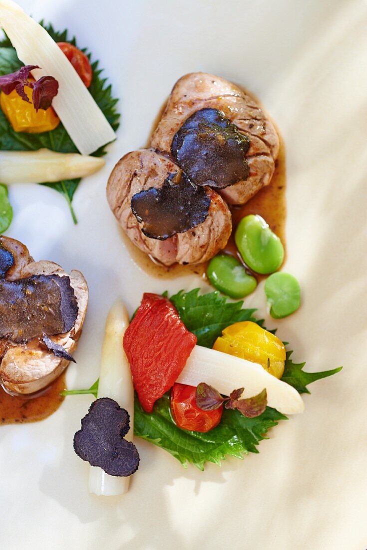 Veal fillet migon with truffle and vegetables (seen from above)