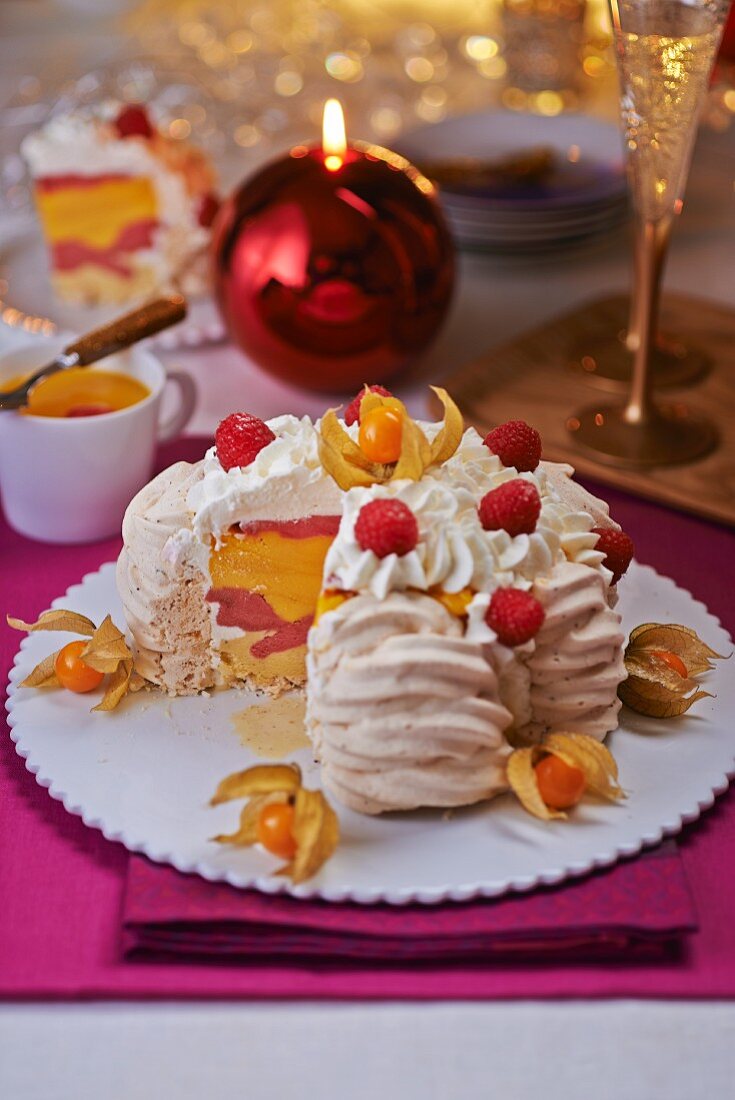 A mini meringue cake with a fruit ice cream filling