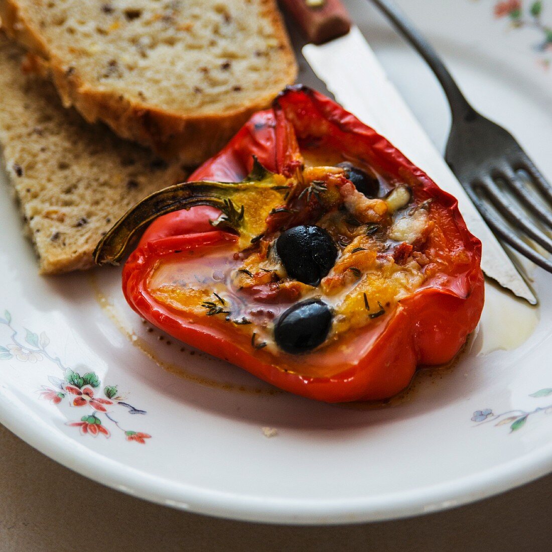 A pepper filled with olives and feta cheese