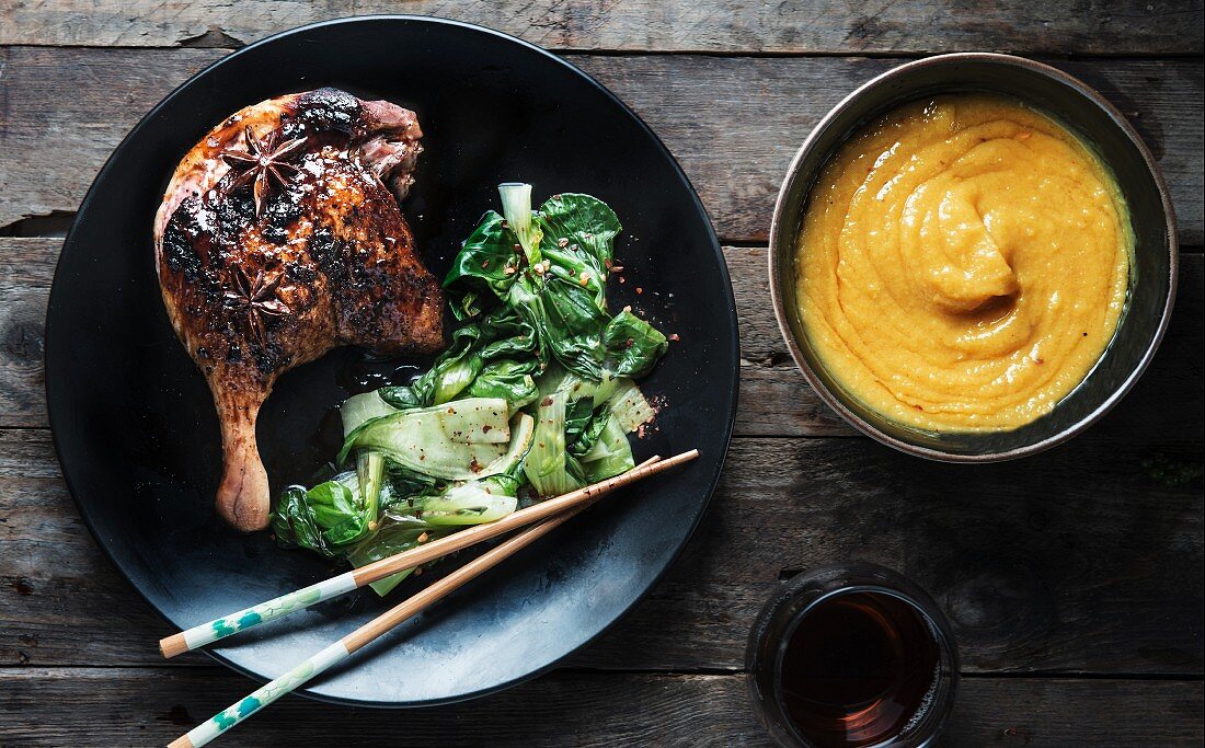 Duck legs with a soy glaze, boy choy and a dip