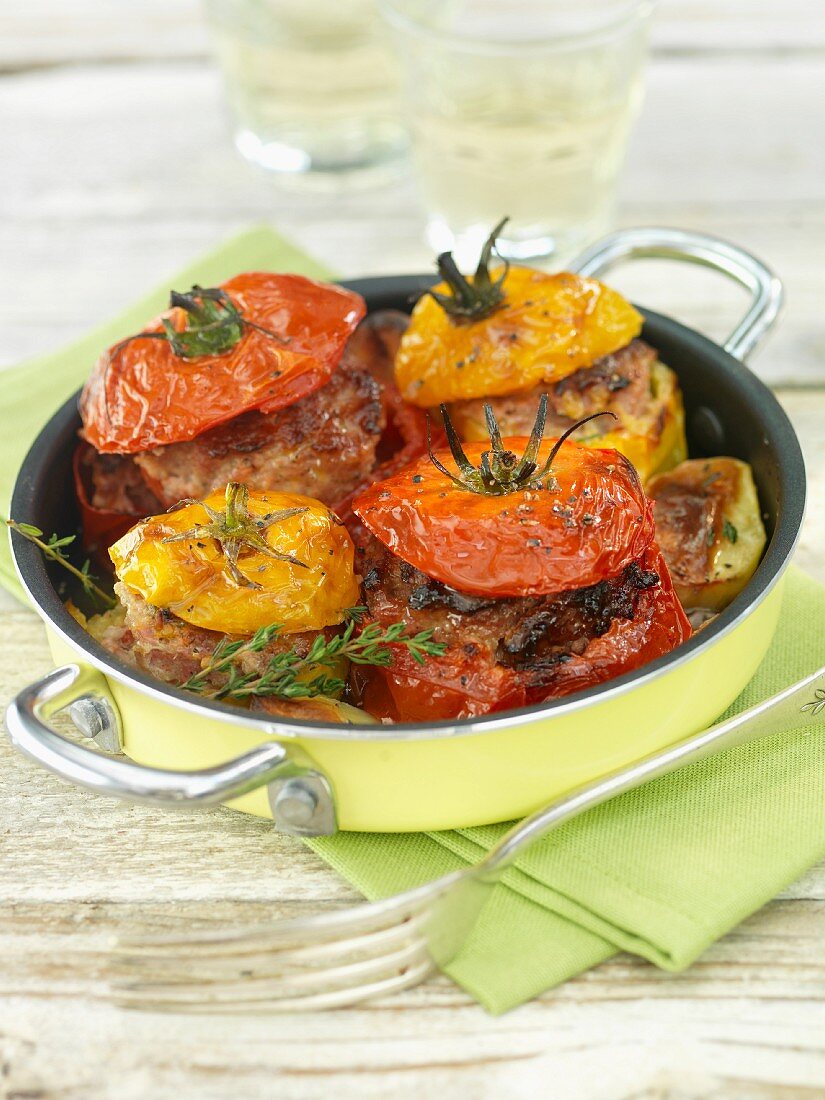 Baked, filled tomatoes with thymes