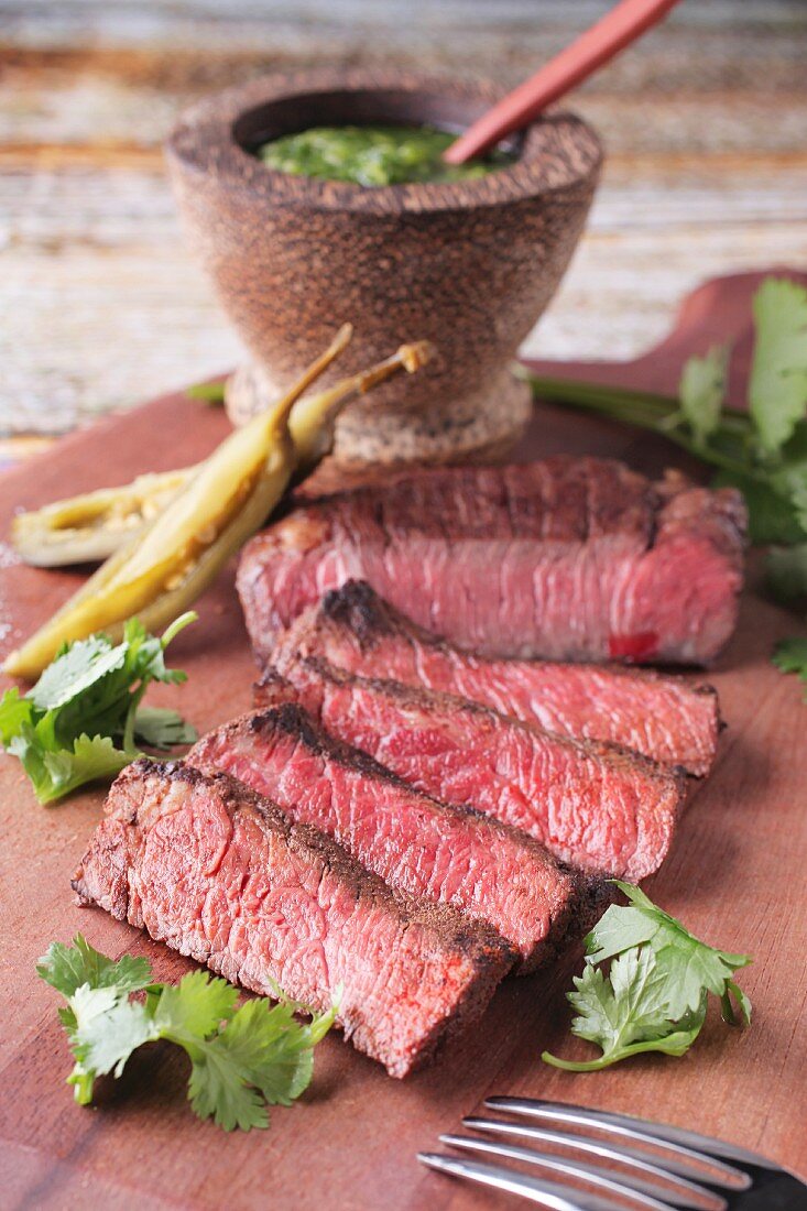 Grilled beef steak with chilli peppers, coriander and salsa verde (Mexico)