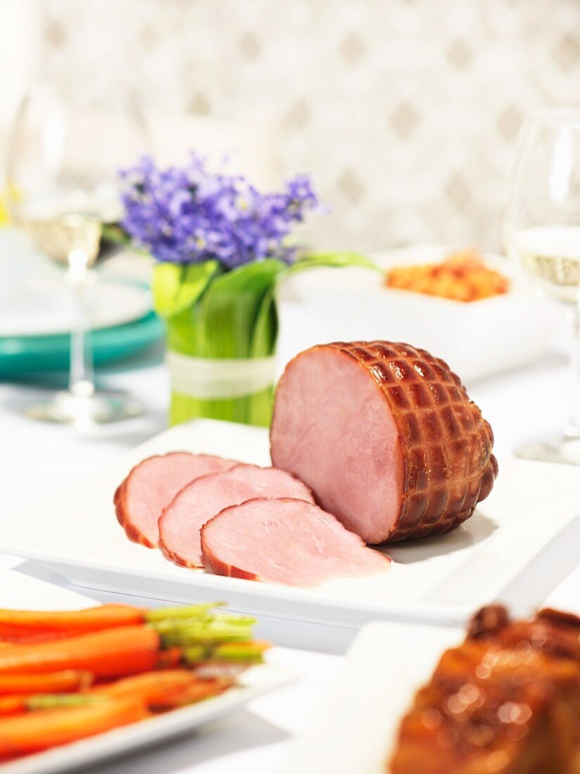 Roast ham with carrots for Easter