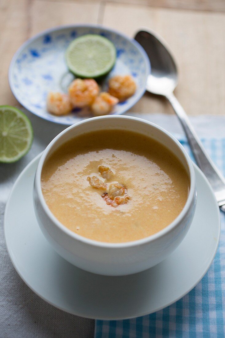 Prawn and coconut soup with limes