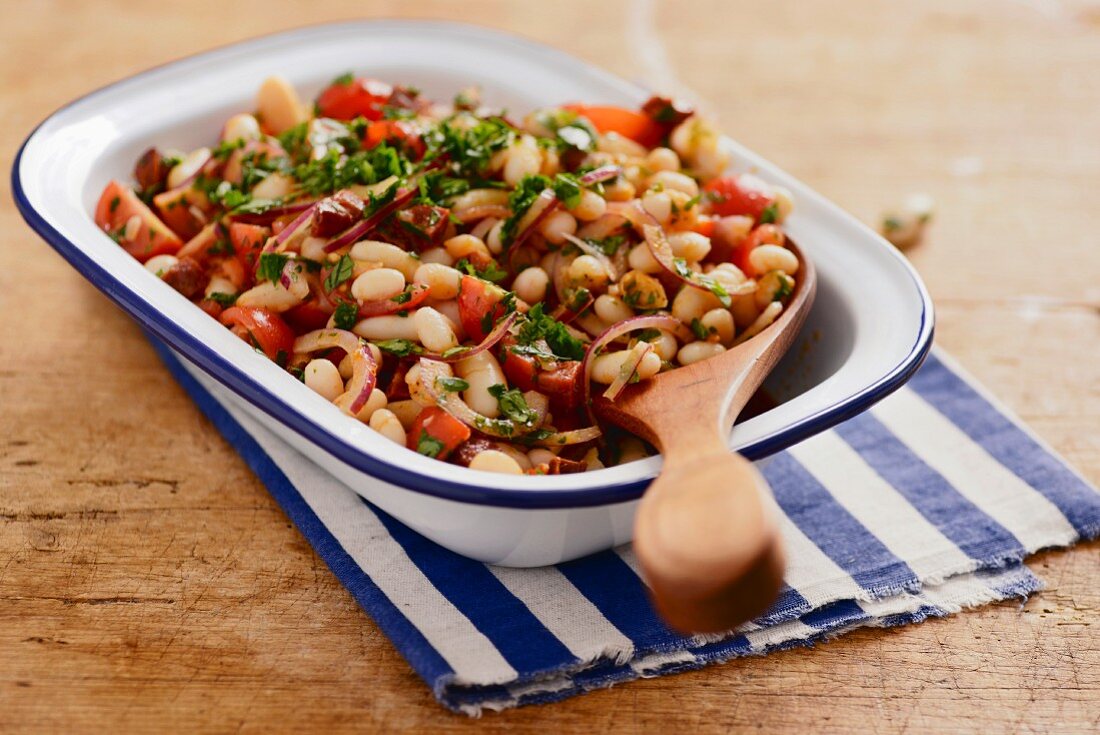Spicy cannellini bean salad with cherry tomatoes and chorizo (Portugal)