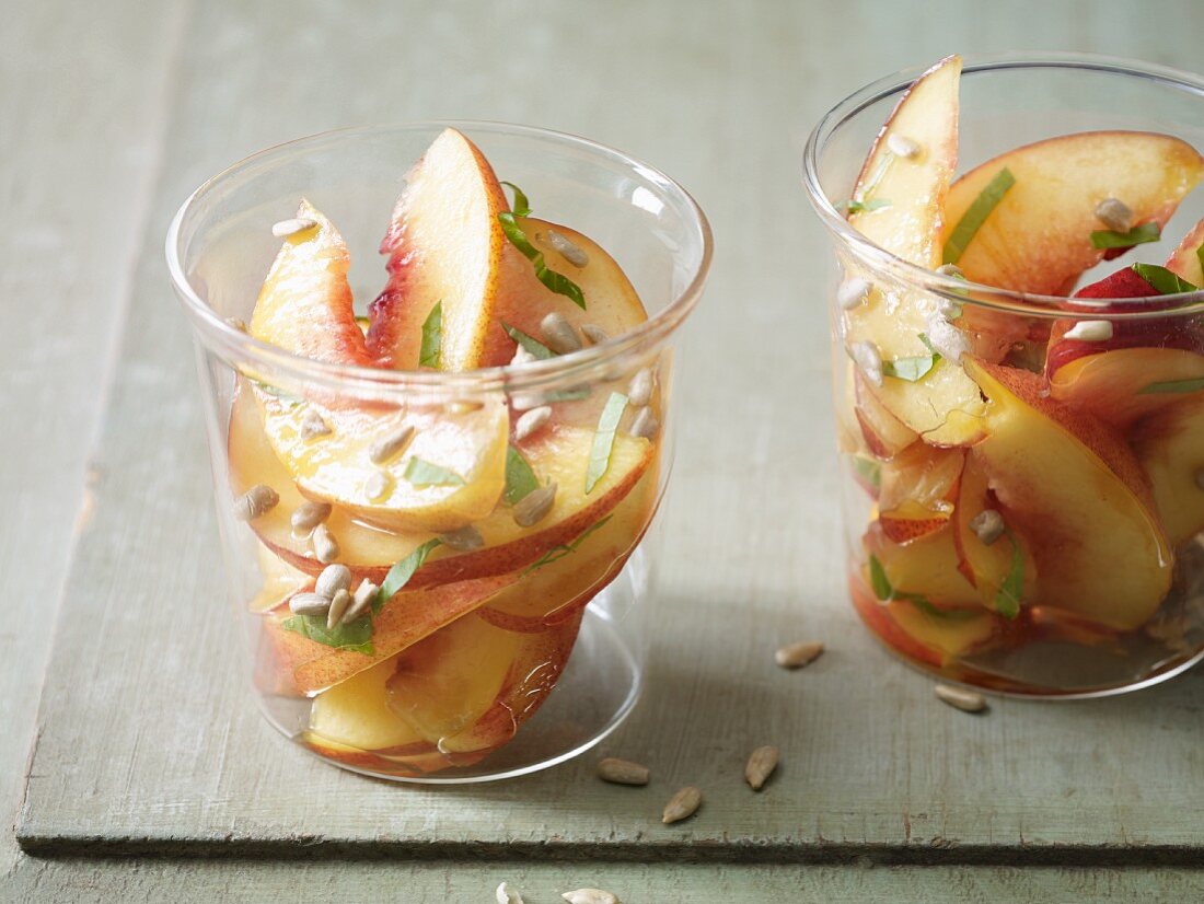 Nectarine salad with maple syrup and basil for an alkaline diet