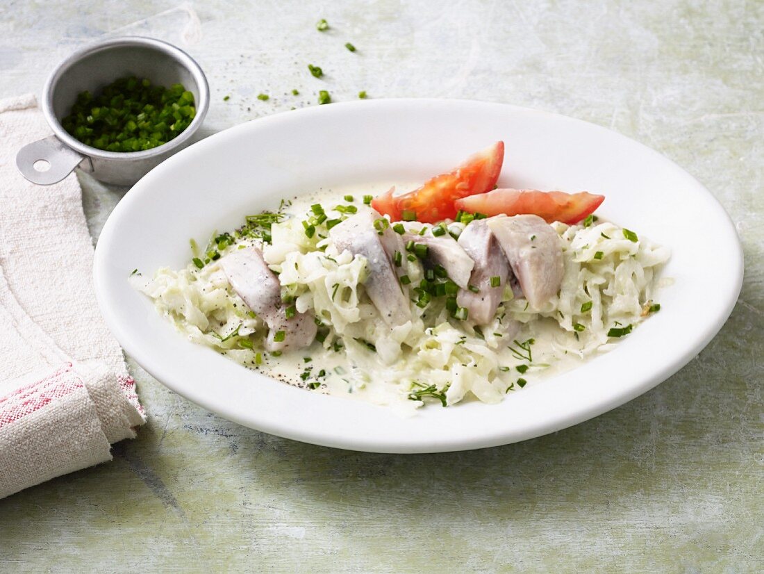 Soused herring salad with horseradish and cucumbers