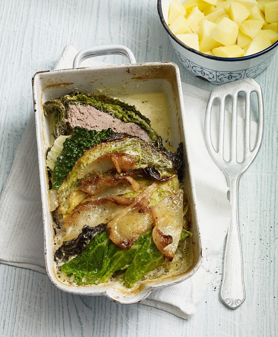 Lamb meatloaf wrapped in savoy cabbage