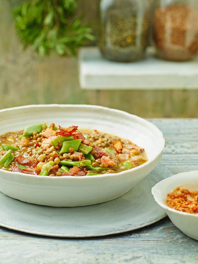 Lentil soup with tomatoes and beans