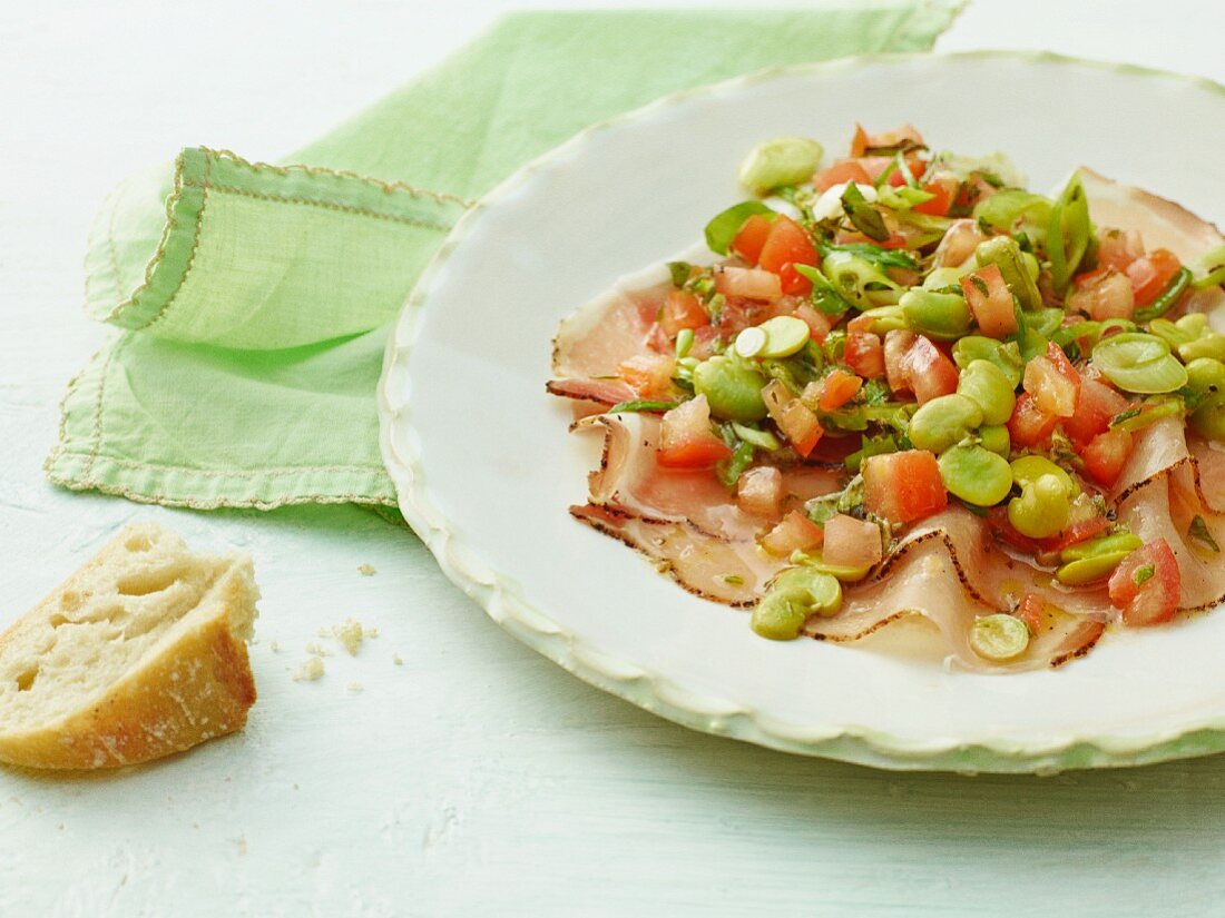 Marinated broad beans with bacon