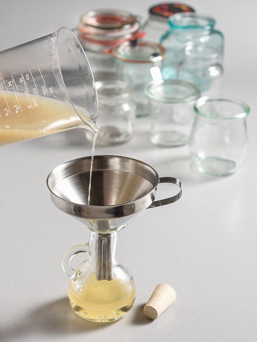 Liquid being poured through a funnel